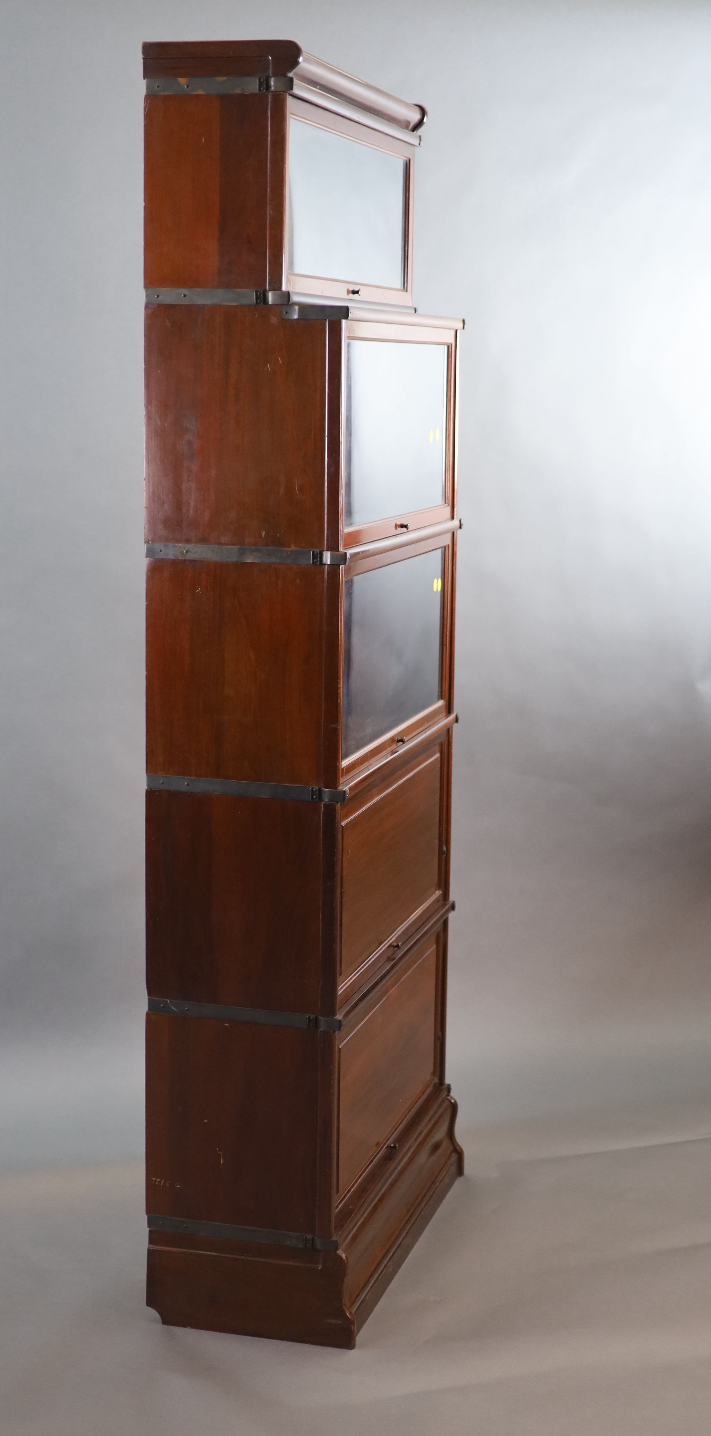 A Globe Wernicke mahogany sectional bookcase, W.87cm D.35.5cm H.220cm.
